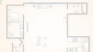 A floor plan of a hotel room with a bed, a desk, a chair, a small table, and a window.