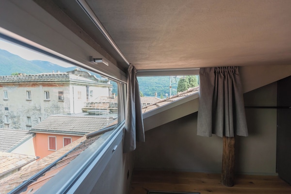 1 habitación, tabla de planchar con plancha y ropa de cama