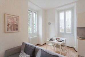 Apartment (1 Bedroom) | Living area | 32-inch flat-screen TV with cable channels - Nonna Tere Apartment by Rent all Como (Carate Urio)