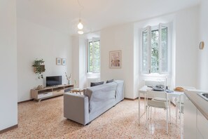 Apartment (1 Bedroom) | Living area | 32-inch flat-screen TV with cable channels - Nonna Tere Apartment by Rent all Como (Carate Urio)