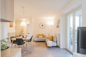 Apartment, 1 Bedroom (Ponente Garden) | Living area | 32-inch Smart TV with digital channels - Ponente Balcony & Garden by Rent all Como (Gravedona)
