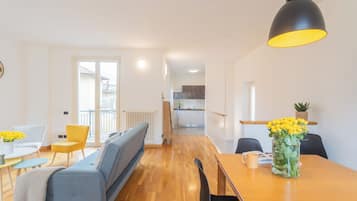 Apartment, 1 Bedroom (Ponente Balcony) | Living area | 32-inch Smart TV with digital channels