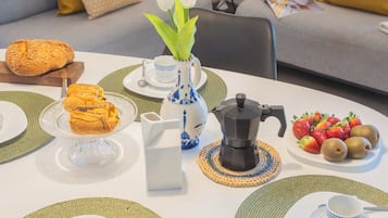 Apartment, 1 Bedroom (Ponente Garden) | Living area | 32-inch Smart TV with digital channels