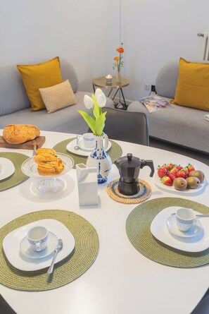 Apartment, 1 Bedroom (Ponente Garden) | Living area | 32-inch Smart TV with digital channels - Ponente Balcony & Garden by Rent all Como (Gravedona)