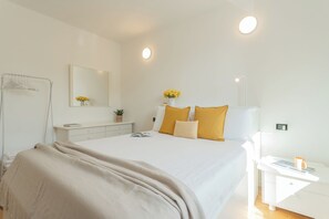 Apartment, 1 Bedroom (Ponente Balcony) | 1 bedroom, iron/ironing board, cribs/infant beds, free WiFi