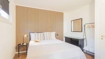 Apartment, 1 Bedroom (Ponente Garden) | 1 bedroom, iron/ironing board, cots/infant beds, free WiFi
