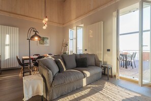 Apartment (2 Bedrooms) | Living area | 32-inch TV with cable channels