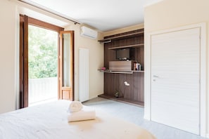 1 bedroom, laptop workspace, iron/ironing board, bed sheets