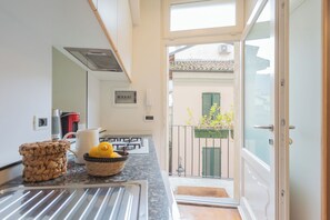 Apartment (1 Bedroom) | Private kitchenette | Oven, espresso maker, electric kettle, highchair