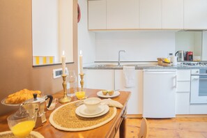 Apartment (1 Bedroom) | Private kitchen | Oven, espresso maker, electric kettle, high chair