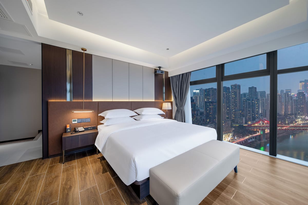 Premium Double Room, River View | Desk, blackout drapes, iron/ironing board, free WiFi