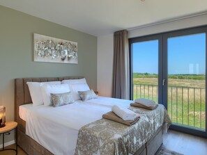 4 室のベッドルーム、旅行用ベビーベッド、WiFi (無料)