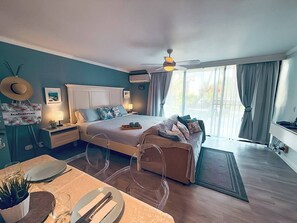 Estúdio, 1 quarto, varanda, vista para o jardim | 1 quarto