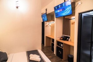 Sistema de insonorización y tabla de planchar con plancha