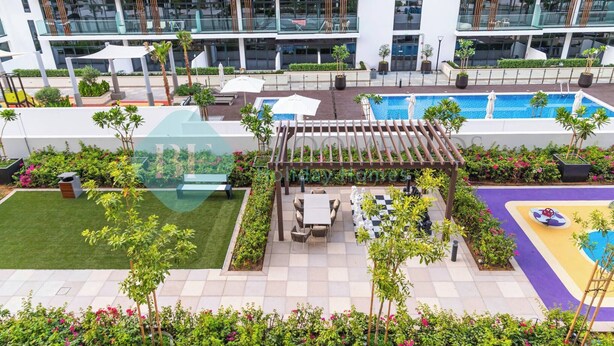 A rooftop garden with a pool, seating areas, and a pergola. - Bloomfields STU Balcony Azizi Riviera Meydan (Dubai)