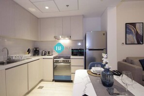 Fridge, microwave, toaster, cookware/dishes/utensils