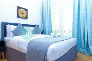 1 dormitorio, tabla de planchar con plancha, wifi gratis y ropa de cama