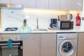 Fridge, microwave, coffee/tea maker, electric kettle