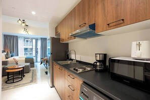 Fridge, microwave, electric kettle, toaster