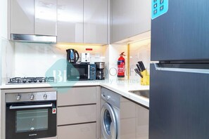 Fridge, microwave, stovetop, coffee/tea maker