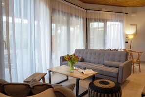 Design Villa, 2 Bedrooms, Private Pool, Mountain View | Living area | 40-inch Smart TV with satellite channels - Pure Nature (Hersonissos)