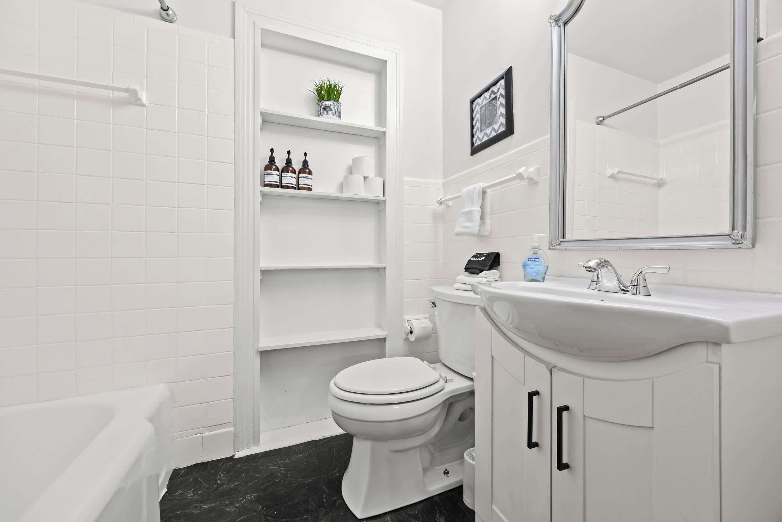 Shower, hair dryer, towels, shampoo