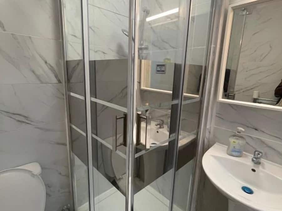 Shower, towels, toilet paper