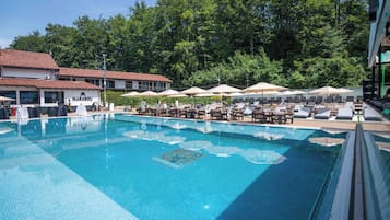 Seasonal outdoor pool, pool umbrellas, pool loungers