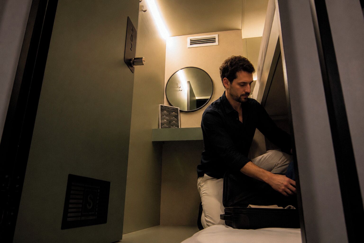 Lower Private Capsule | Desk, laptop workspace, free WiFi, bed sheets