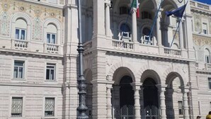A historic building with ornate architecture, including arched windows and decorative moldings. - Trieste Central Holiday Home (Trieste)