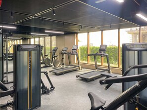 Fitness facility - Modern Studio with rooftop pool and gym in JVC (Dubai)
