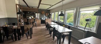 World Lodge with unique, city-inspired rooms, located by the forest