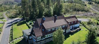 World Lodge with unique, city-inspired rooms, located by the forest