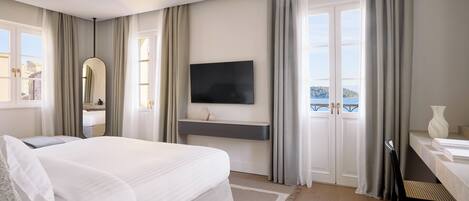 Suíte estúdio luxo, vista para o mar | Roupas de cama premium, frigobar, cofres nos quartos, escrivaninha