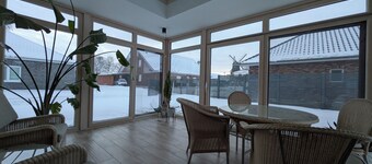 Vacation home Magnolia Möhlenwarf - conservatory and garden 4 persons + pet