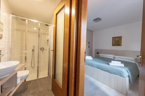 Shower, eco-friendly toiletries, hair dryer, bidet