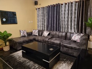 Living area - Home in charming Harare with WiFi, AC , Smart TV and more. Enjoy your stay (Harare)