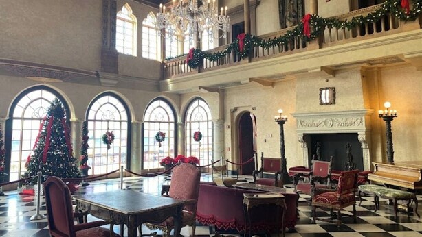 A grand hall with a high ceiling, chandeliers, and a checkered floor. - IMG, Bradenton Beach, Anna Maria, Siesta Key Beach Beautiful & Centrally Located (Sarasota)