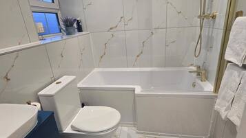 Hair dryer, towels, soap, toilet paper