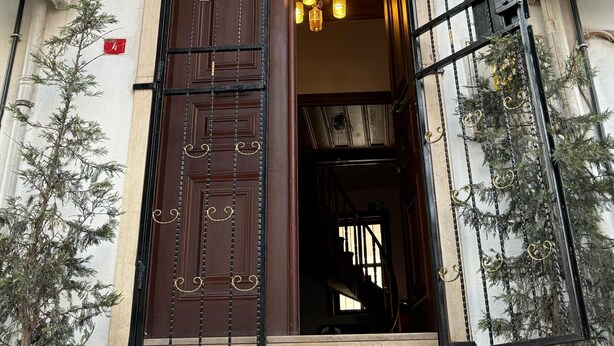 The exterior of a hotel named "Grand Bedir" with a prominent sign, a decorative entrance door, and air conditioning units on the facade. - Grand Bedir (Istanbul)