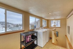 Convenient laundry facilities offer a view of the surrounding landscape.