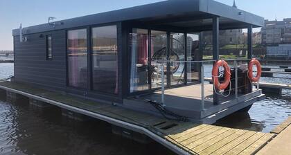 House in DziwnĂłw by the Water and Beach