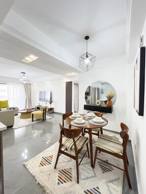 Family Apartment, 2 Bedrooms, Balcony, City View | In-room dining