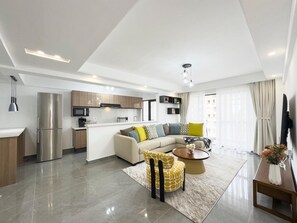 Appartement Familial, 2 chambres, balcon, vue ville | Coin séjour