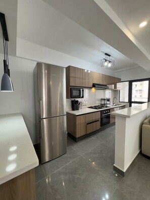 Appartement Familial, 2 chambres, balcon, vue ville | Cuisine privée