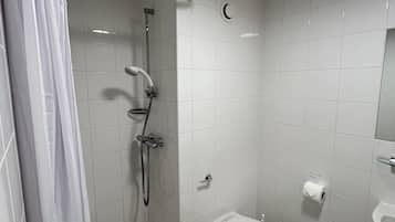 Standard Single Room | Bathroom | Shower, hair dryer, towels, soap