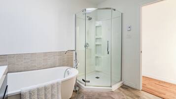 Shower, hair dryer, towels, toilet paper