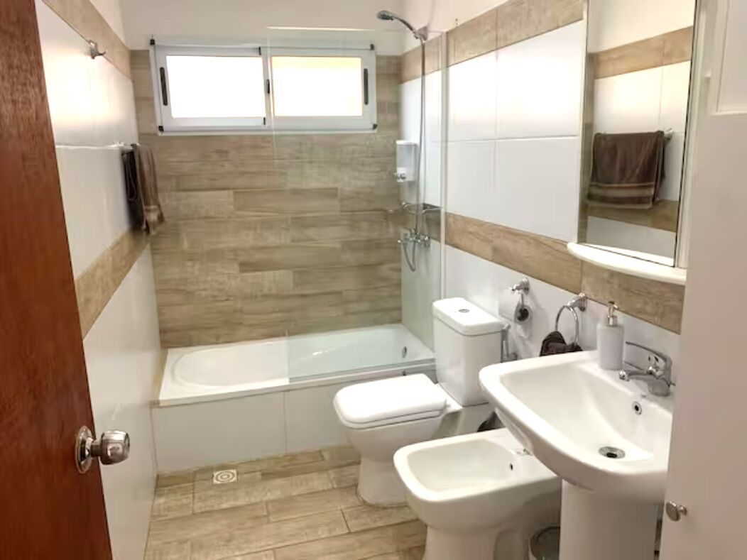 Shower, towels, soap, toilet paper
