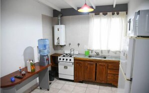 Appartement familial, patio, vue sur la cour intérieure | Cuisine privée | Cafetière-théière, bouilloire électrique
