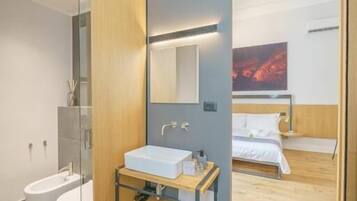 Shower, hair dryer, slippers, towels